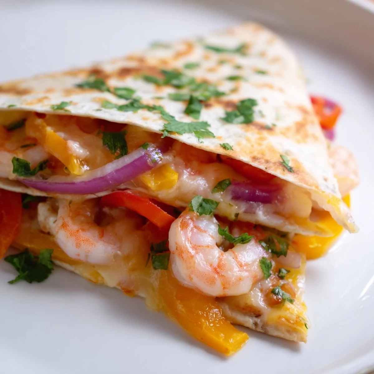 Golden-baked Shrimp Fajita Sheet Pan Quesadillas sit crisp and ready to serve on a rustic wooden board.