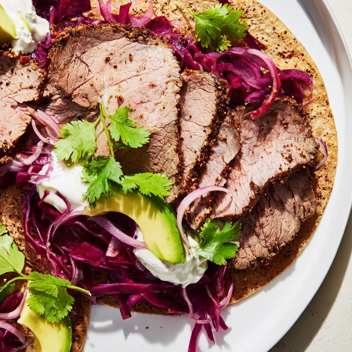 Succulent roasted leg of lamb with fragrant cumin served in soft tacos