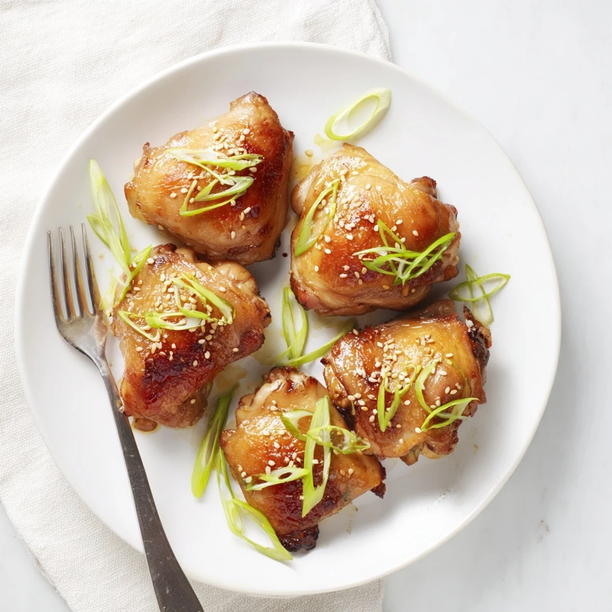 Golden oven-roasted Five Spice Chicken thighs with crispy glazed skin and aromatic marinade