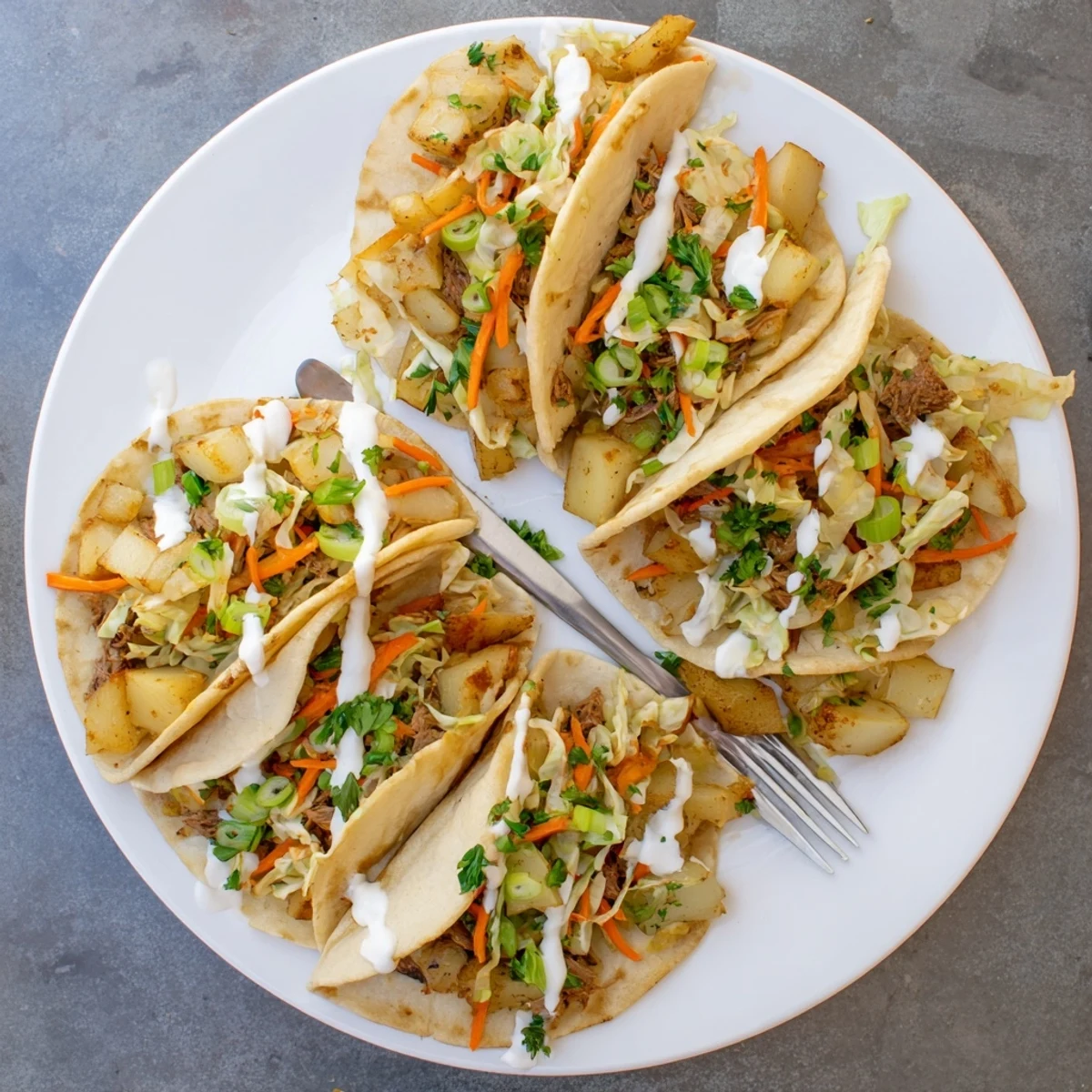 Flour tortillas wrapped around tender corned beef, golden potatoes, and fresh crunchy cabbage slaw