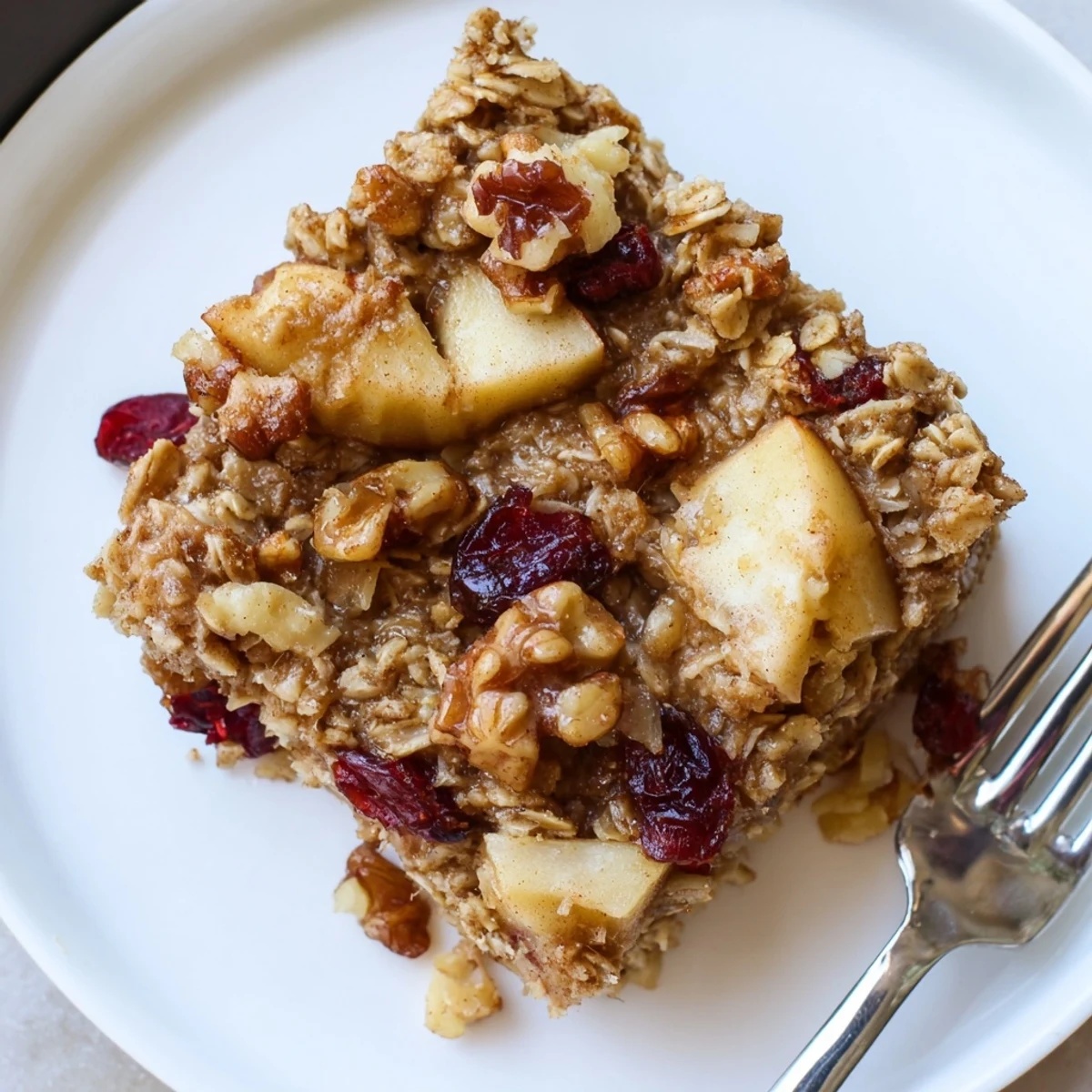 Family style pan of Delicious Apple Cinnamon Oatmeal Bake Recipe For Mornings, nutty aroma