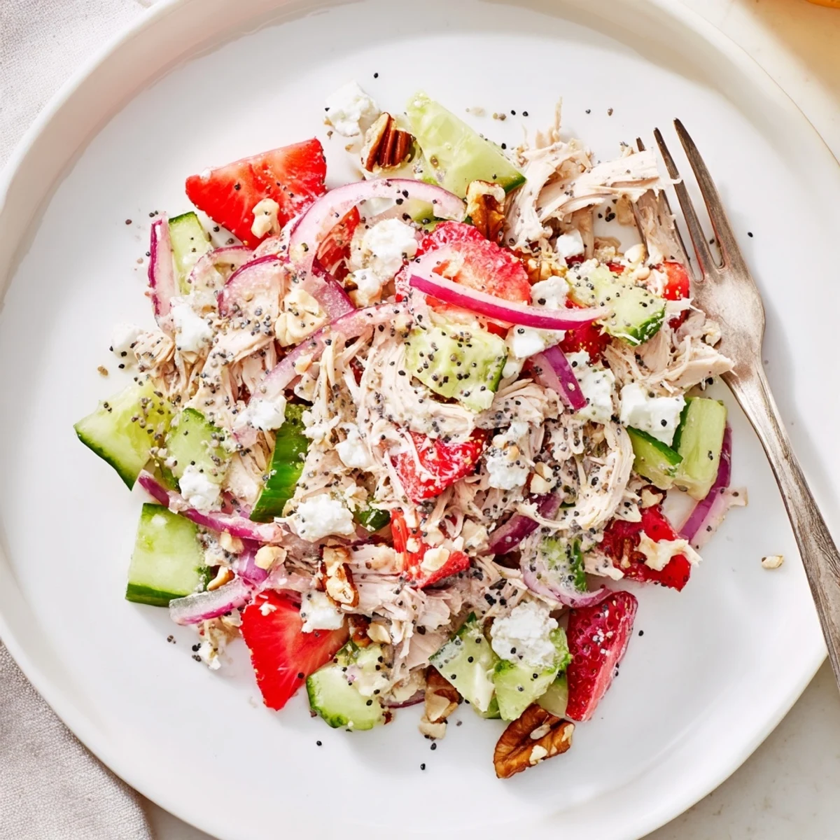 Strawberry Poppy Seed Rotisserie Chicken Salad with juicy strawberries and crunchy pecans